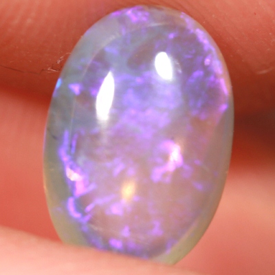 SOLID CRYSTAL OPAL Transparent with rich purple sparkles
